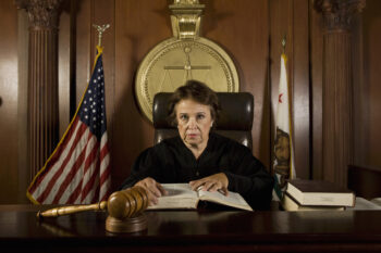 Judge sitting in court, portrait