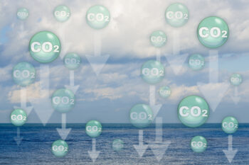 CO2 Carbon dioxide emissions are absorbed by the oceans causing warming of the seas and acidification of the waters - The ocean acts as a carbon sink - concept image