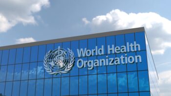 World Health Organization This stunning 4K footage captures the iconic corporate logo of a well-known company displayed on the facade of a glass building. Perfect for editorial use only.